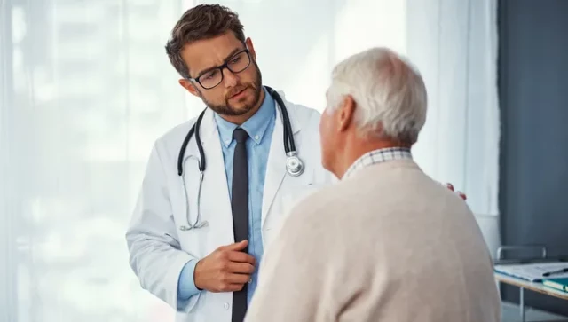 Medical Doctor Speaking to a Patient on Prostate Cancer